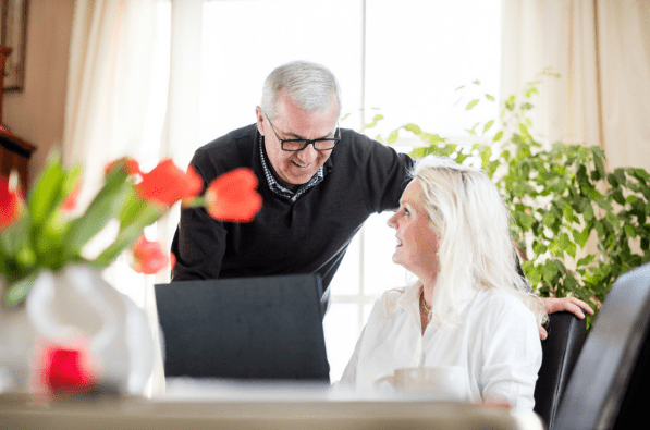 Older couple working from home